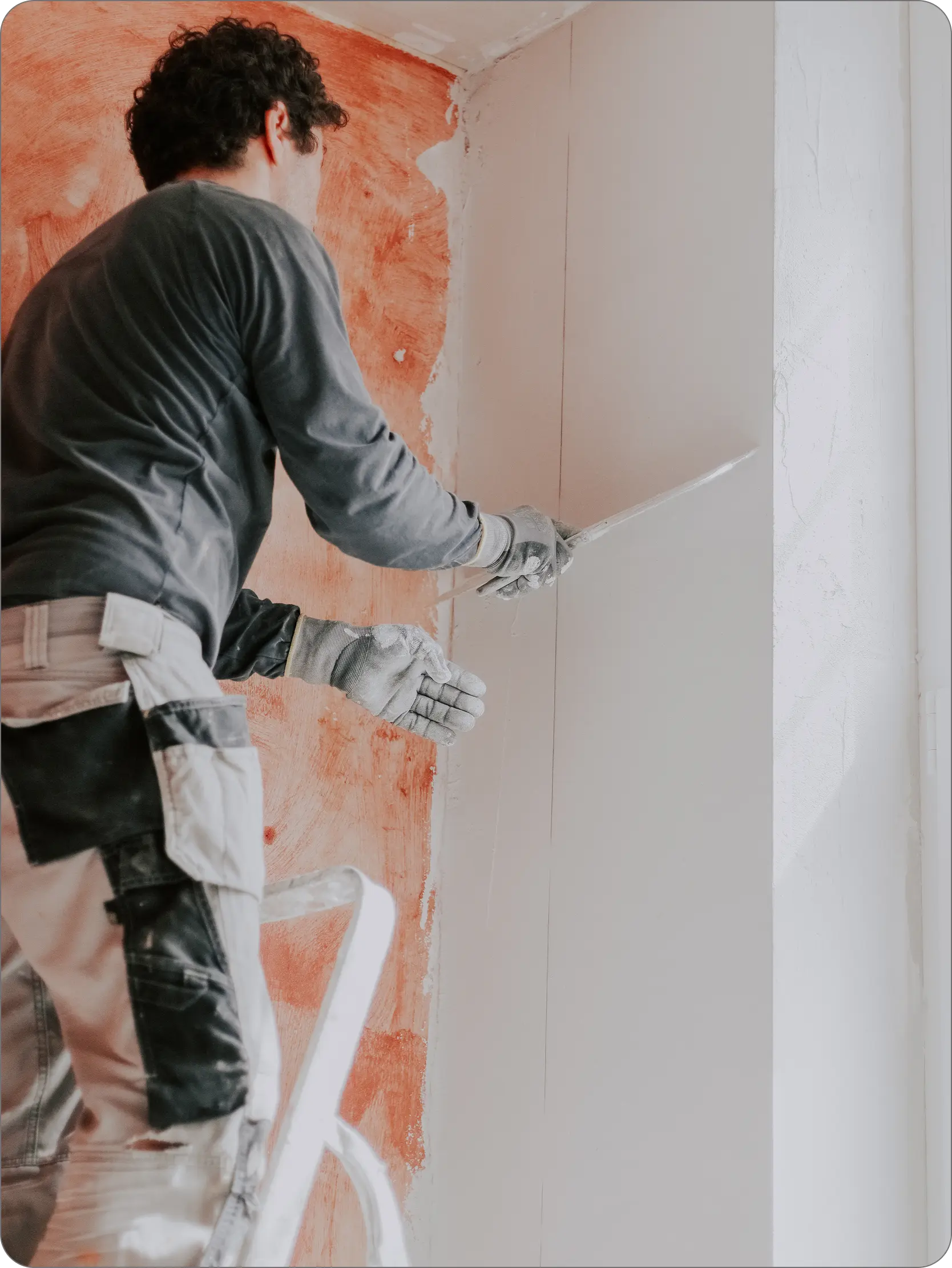 Handy Wizzard team member installing the drywall